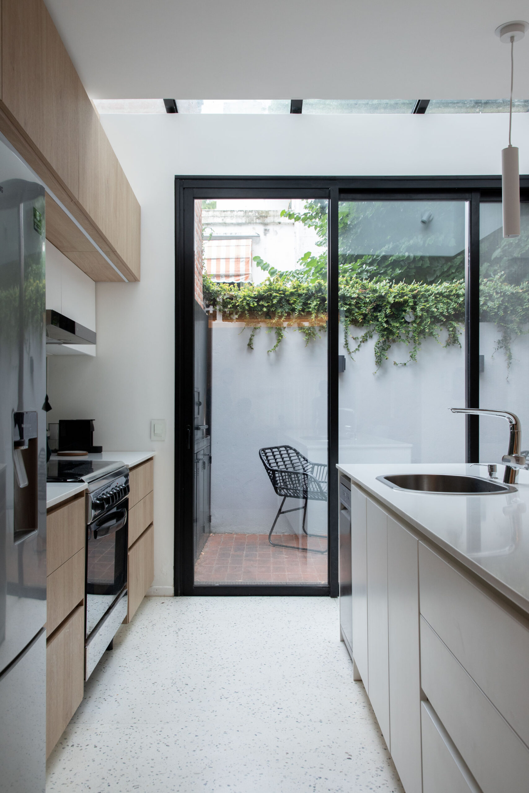 Una cocina protagonista y un patio recuperado para una familia en Vicente López